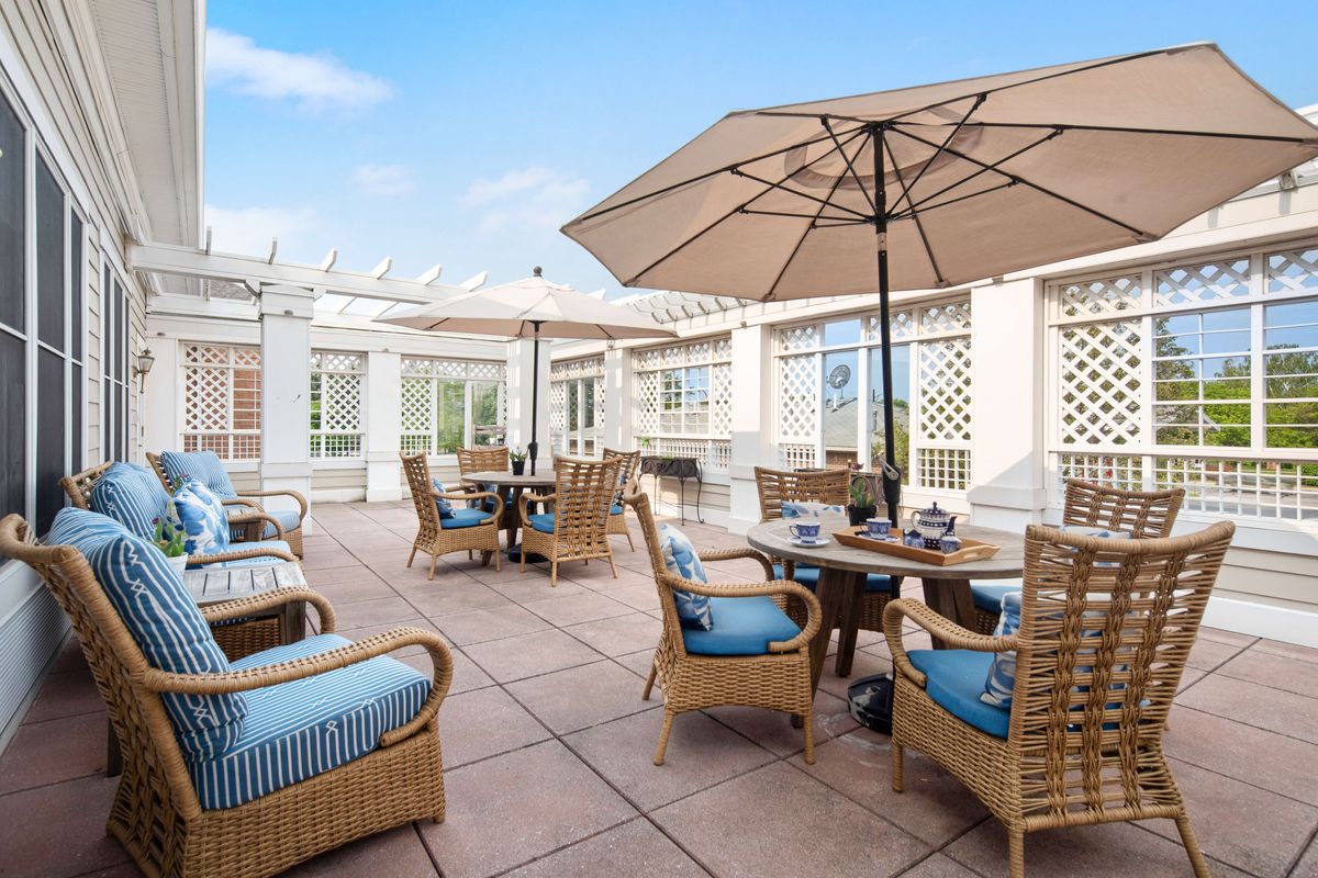 Outdoor seating area with umbrellas and chairs