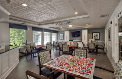 Bright activity room with bingo game setup