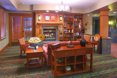 Cozy common area with seating and fireplace