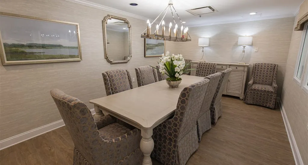 Elegant dining room with a large table and comfortable chairs