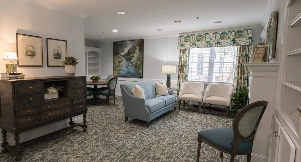 Bright and cozy interior common area with seating