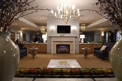Interior lounge area with seating and fireplace