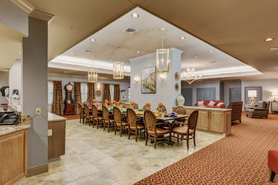 Bright dining room with a long table and decor