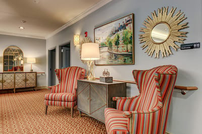Bright lobby area with comfortable seating and artwork