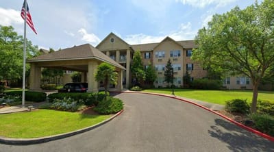 Exterior view of The Haven at Windermere with landscaped entrance