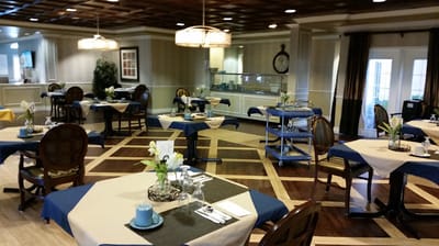Dining room with tables set for meals