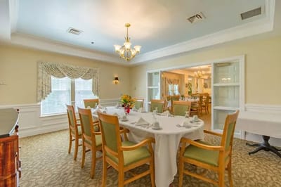 A beautifully set dining room with a large table