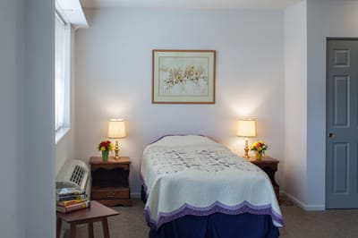 Cozy interior of a resident room with bedside lamps