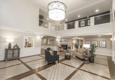 Lobby of a senior living facility with seating
