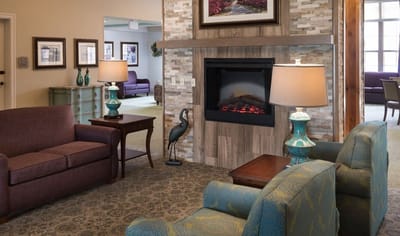 Cozy common area with seating and fireplace