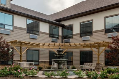 Courtyard with a fountain and seating area