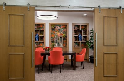 Bright common area with colorful decor and seating