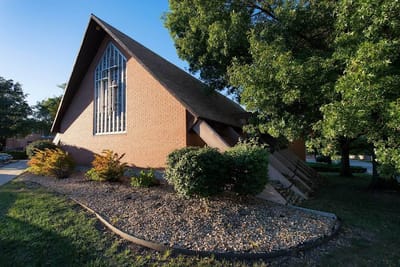 Exterior view of a building surrounded by landscaping