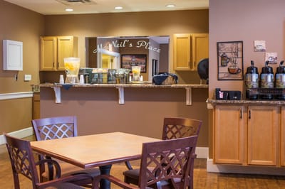 Interior view of a common area with a coffee station