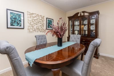 Dining area with a wooden table and chairs