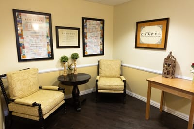 Interior seating area with decor and two chairs