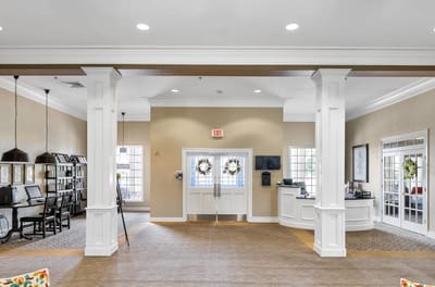 Bright common area with reception and seating