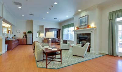 Common area with seating and a fireplace