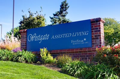 Sign for Westgate Assisted Living with landscaping