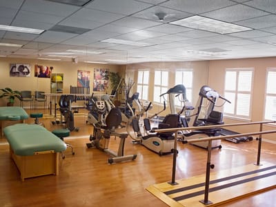 Interior view of a fitness area with exercise equipment