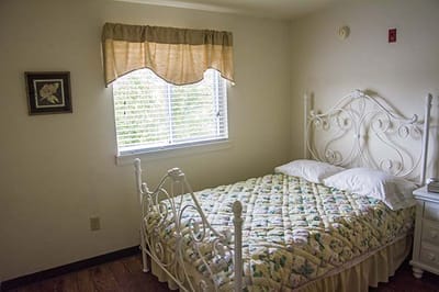 Cozy bedroom with light colors and natural light