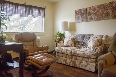 Cozy living room setup with floral furniture
