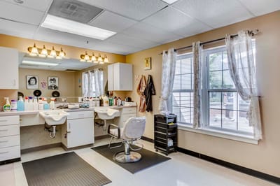 Salon area with styling chairs and products