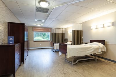 A bright and spacious resident room with two beds