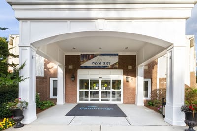 Entrance of a senior living facility with garden