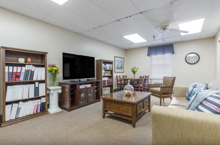 Cozy common area with seating and TV
