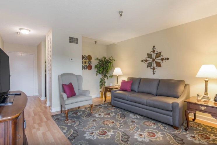 Cozy interior of a resident's room with couch and decor