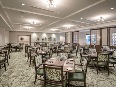 Dining room with tables set for meals