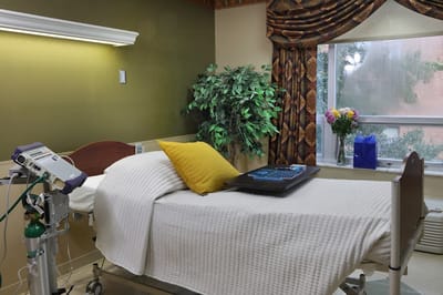 Cozy private resident room with a bed and decorations