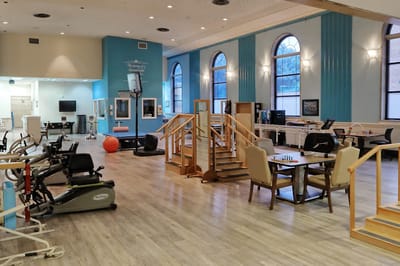 Interior view of a multi-purpose activity room with equipment