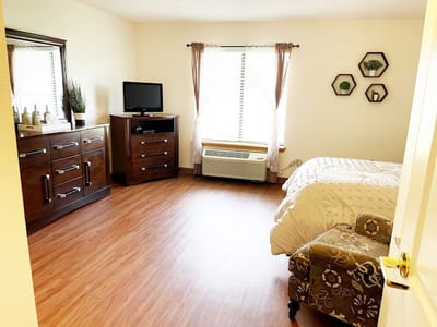 Cozy interior room with a bed and furniture