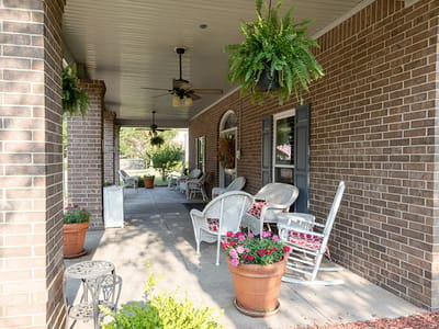 Outdoor porch with seating and plants