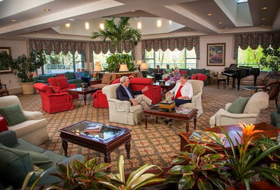 Residents engaged in conversation in the common area