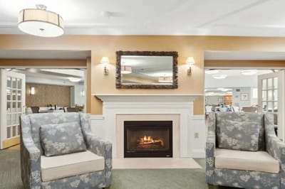 Cozy common area with comfortable seating and a fireplace