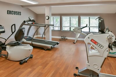 Interior view of a fitness room with exercise equipment