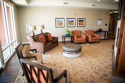 Bright common area with seating and decor