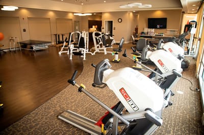 Interior view of a fitness area with exercise equipment