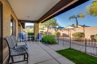 Outdoor seating area with a view of the garden