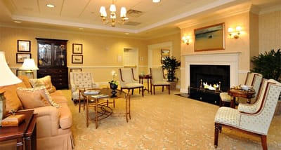 Cozy lounge area with comfortable seating and fireplace