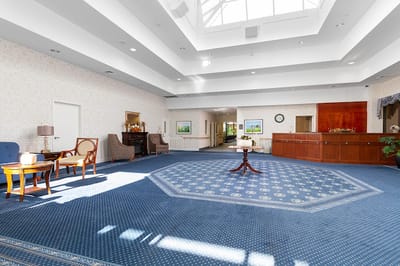 Bright interior lobby with seating and reception area