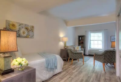 Bright interior of a resident room with furnishings
