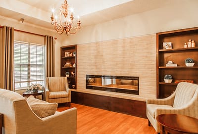 Cozy common area with a fireplace and seating