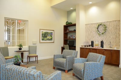 Bright common area with comfortable seating and decor