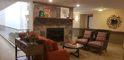Cozy interior lounge area with seating and décor