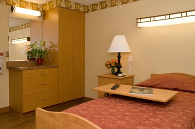 Cozy private room with a bed and amenities