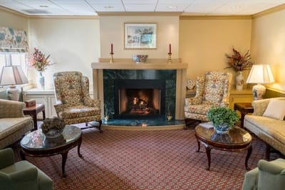 Cozy common area with a fireplace and seating